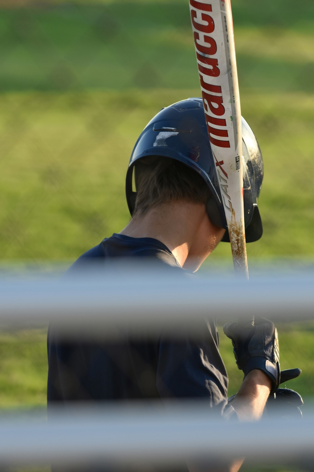 Baseball player preparing at the plate